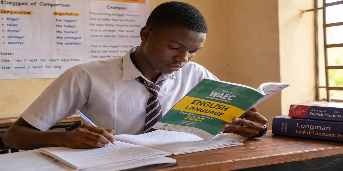 Nigerian secondary school Student revising waec English notes